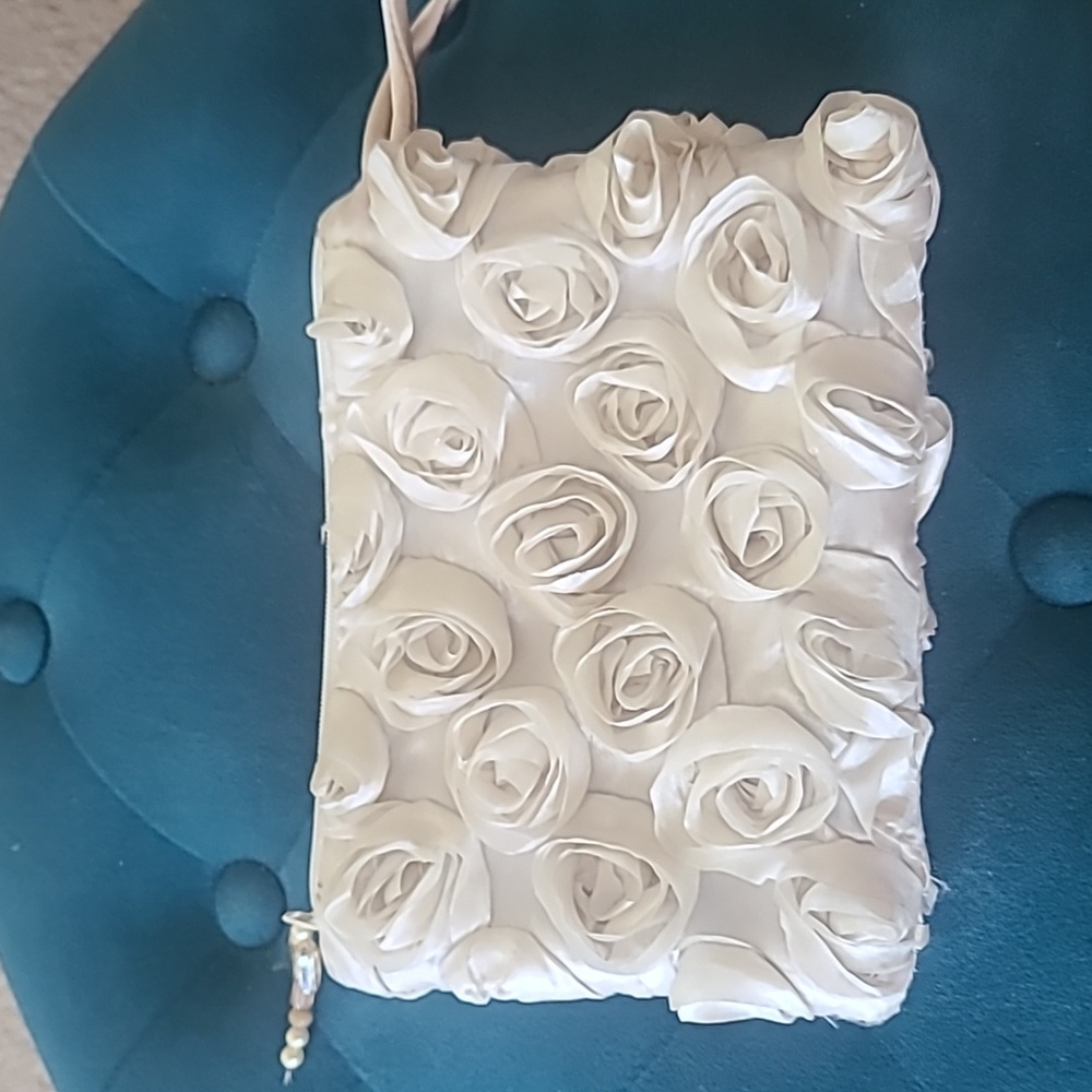 Handmade ivory clutch with ribbon roses